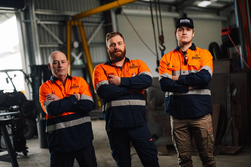 Baxter’s Auckland engineers standing together in their workshop